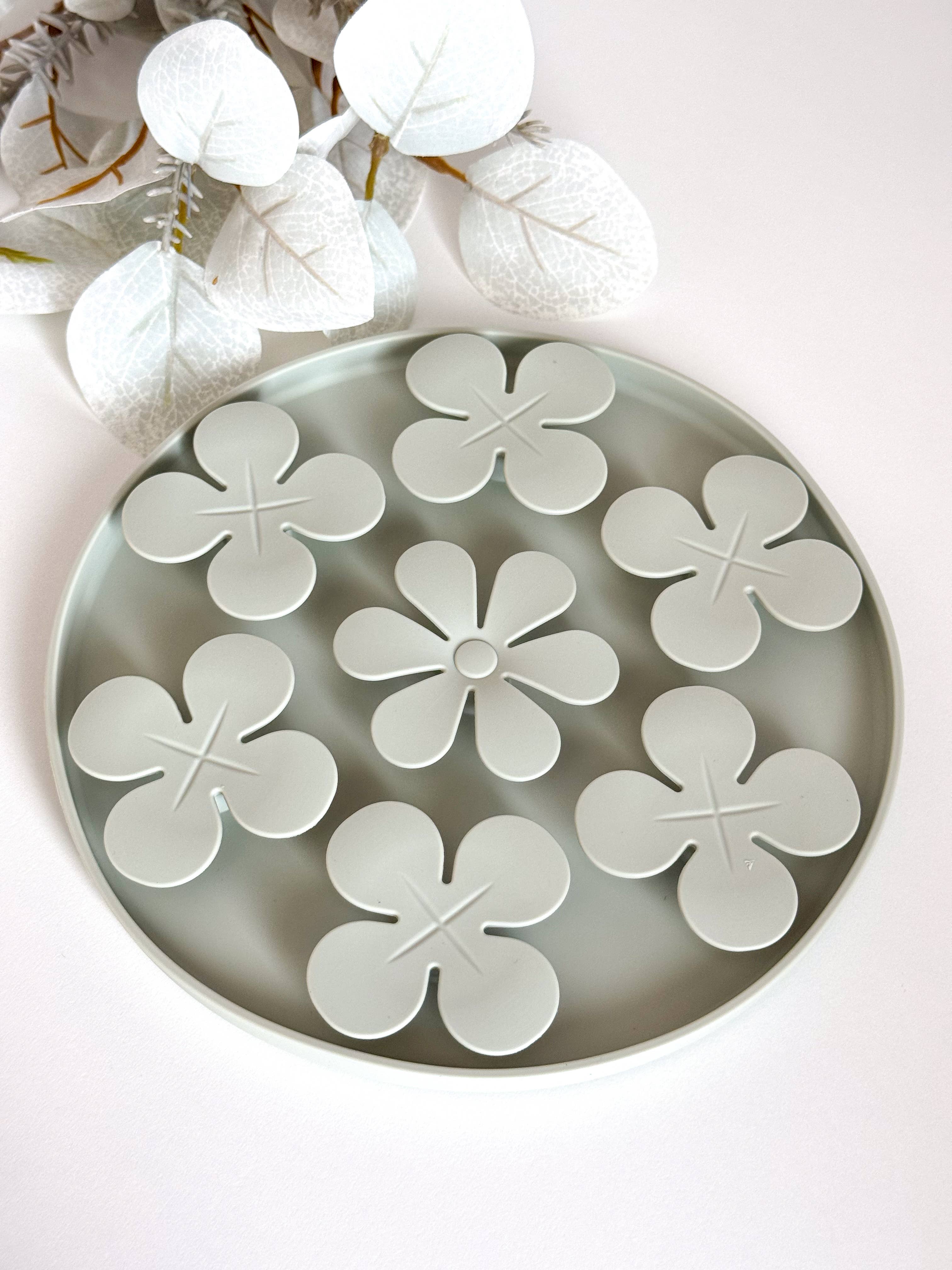 Fleurs de tapis de léchage pour chiens et chats